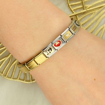 Charms Nomination Serce czerwone z kokardą 030283 33 – elegancki dodatek do bransoletki gold.jpg